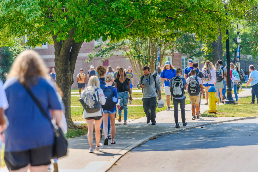 Students walking across Middle Tennessee State University campus during summer term.