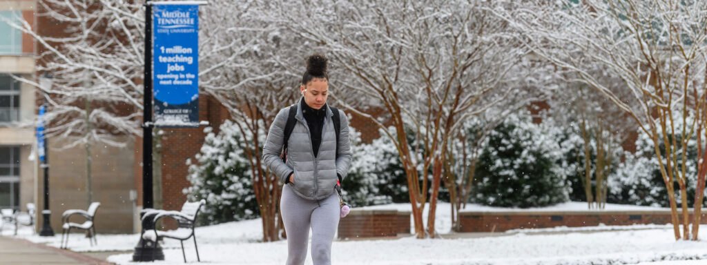 Students walking on the MTSU campus during winter term.
