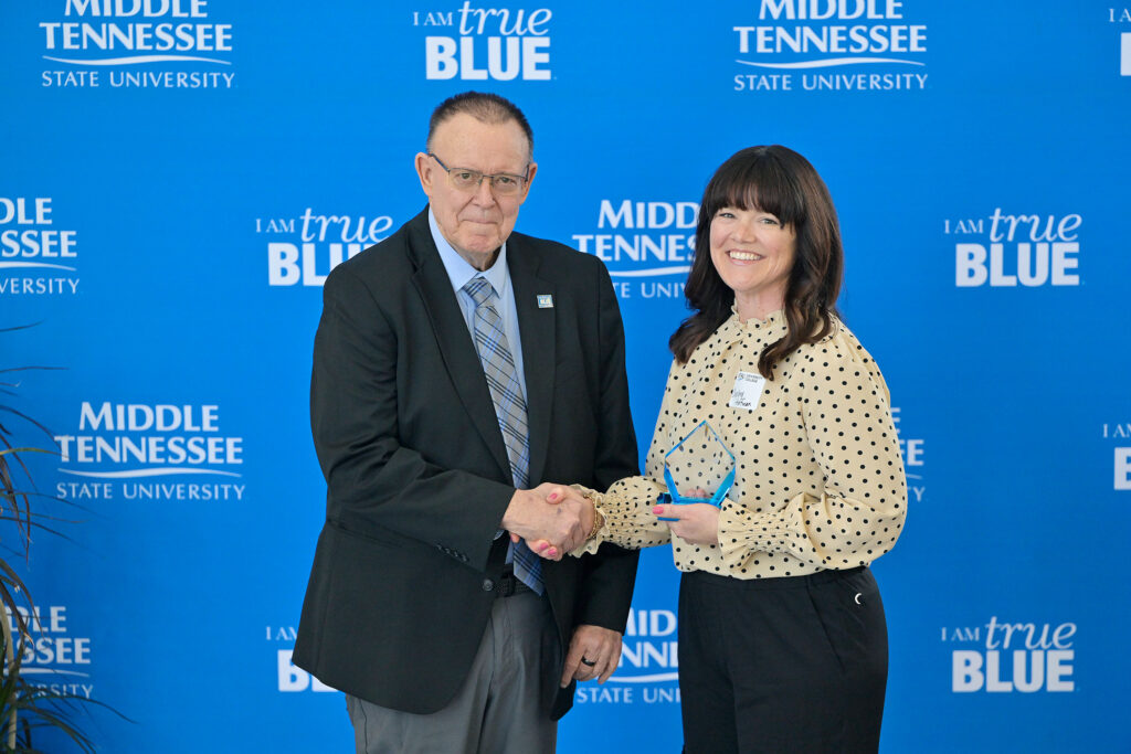Dean Richard Sluder and Graduate Student Award winner Charlene Huffman are photographed at the 2026 University College Awards ceremony, held Thursday, April 30 at Andrew Woodfin Miller, Sr. Education Center at Middle Tennessee State University. 